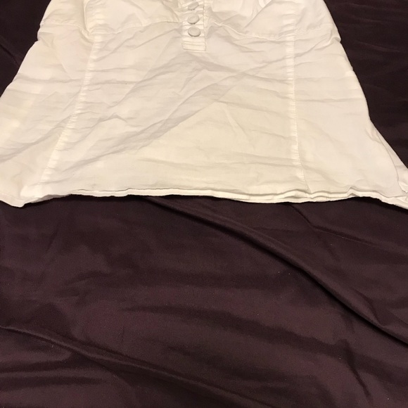White shirt with buttons. - Picture 4 of 4